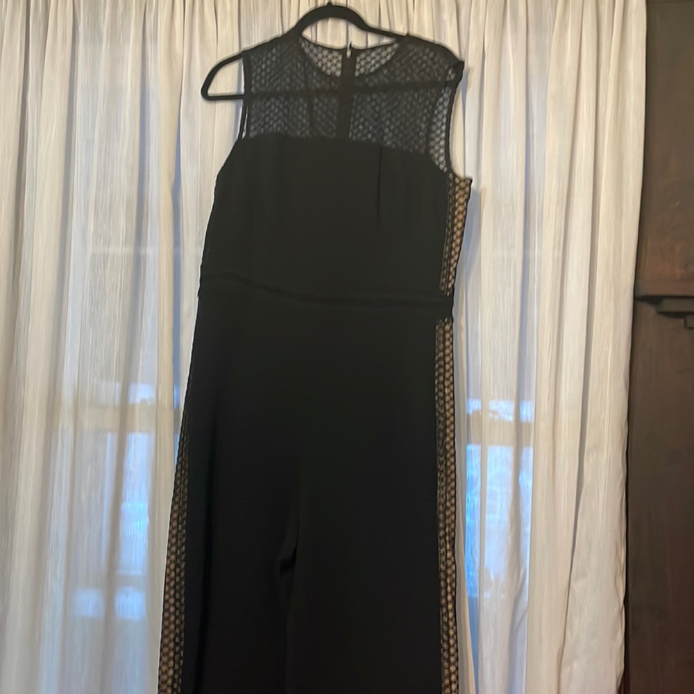 NWT Stylish Black jumpsuit-- lace detail with nude accent . Size XL /12
